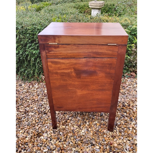 357 - A GEORGIAN MAHOGANY GENTLEMAN'S WASHSTAND
The fold over top enclosing a fitted interior above cupboa... 