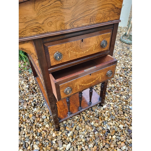 358 - A LATE VICTORIAN ROSEWOOD AND MARQUETRY INLAID DAVENPORT DESK
The rise and fall top enclosing and bi... 