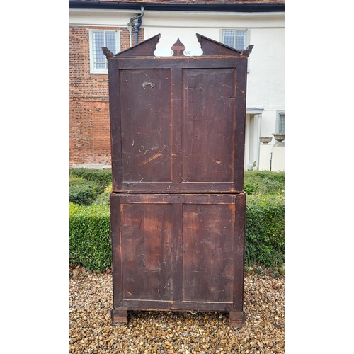 361 - AN 18TH CENTURY SOLID MAHOGANY NEO CLASSICAL BUREAU BOOKCASE 
With architectural pediment above two ... 