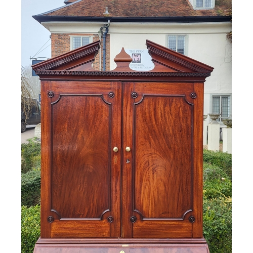 361 - AN 18TH CENTURY SOLID MAHOGANY NEO CLASSICAL BUREAU BOOKCASE 
With architectural pediment above two ... 