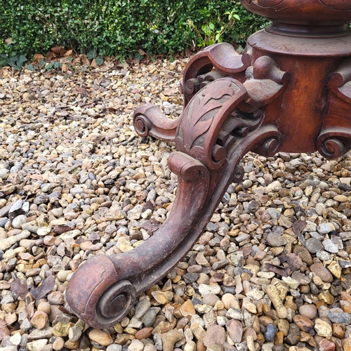 362 - A VICTORIAN BURR WALNUT LOO TABLE
The oval top supported on a carved bulbous column with four splaye... 