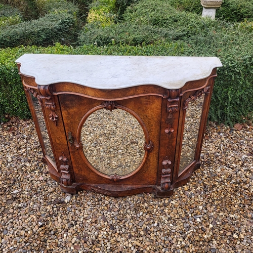 363 - A VICTORIAN BURR AND FIGURED WALNUT SIDE CABINET/CREDENZA 
With white marble serpentine top above an... 