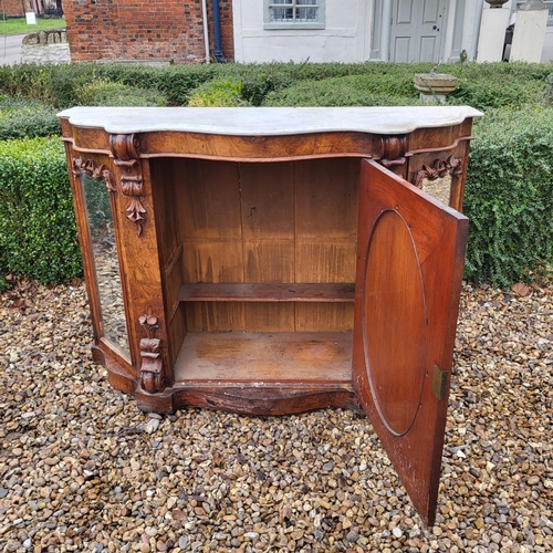 363 - A VICTORIAN BURR AND FIGURED WALNUT SIDE CABINET/CREDENZA 
With white marble serpentine top above an... 