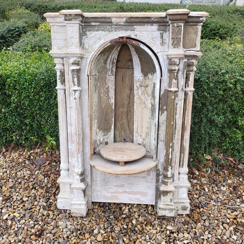 366 - A LARGE 19TH CENTURY FRENCH LIMED WOOD NICHE
With central articulated doors flanked by turned and re... 