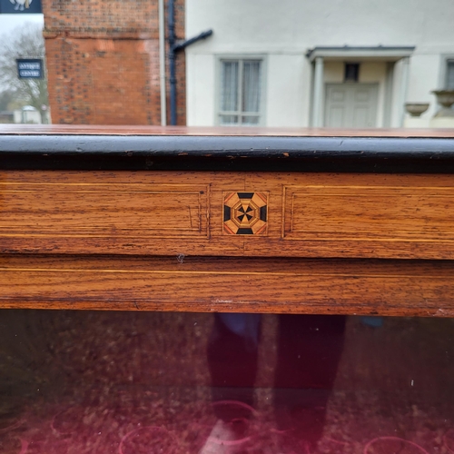 369 - A VICTORIAN MAHOGANY AND MARQUETRY INLAID DISPLAY CABINET/PIER CABINET
With a single arched glazed d... 