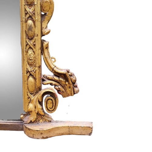 370 - A LARGE 19TH CENTURY GILT FRAMED MIRROR
With arched top egg and dart moulded frame original silvered... 