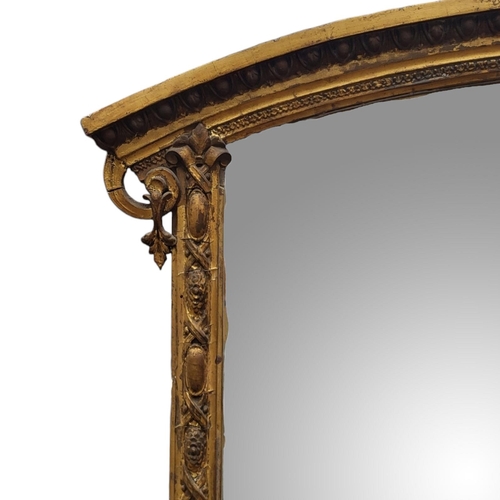 370 - A LARGE 19TH CENTURY GILT FRAMED MIRROR
With arched top egg and dart moulded frame original silvered... 