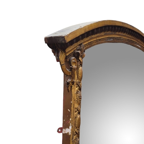 370 - A LARGE 19TH CENTURY GILT FRAMED MIRROR
With arched top egg and dart moulded frame original silvered... 