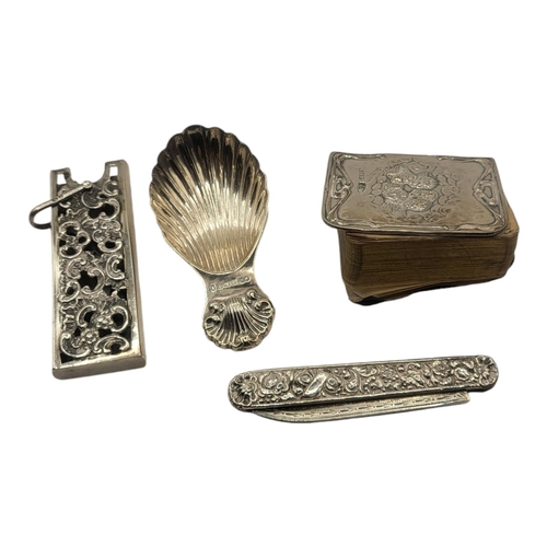 38 - A VICTORIAN SILVER COMB CASE
Rectangular form, with pierced decoration and hanging bale, hallmarked ... 