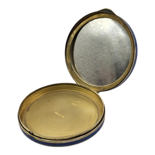 45 - AN EARLY 20TH CENTURY CONTINENTAL SILVER AND ENAMEL POWDER COMPACT
Blue guilloché enamel with dried ... 