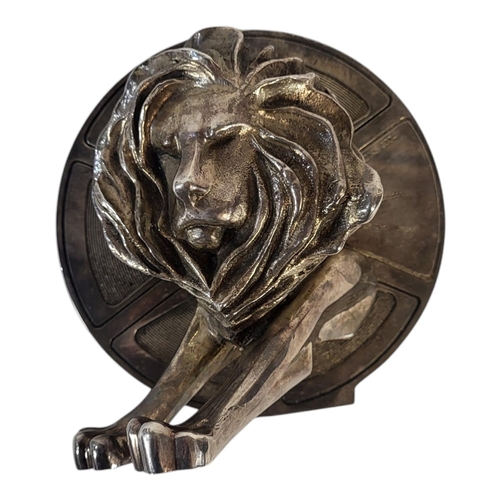 57 - A VINTAGE SILVER PLATED CANNES LION FILM REEL AWARD
Lion with film reel, marked to reverse ‘Arthus B... 