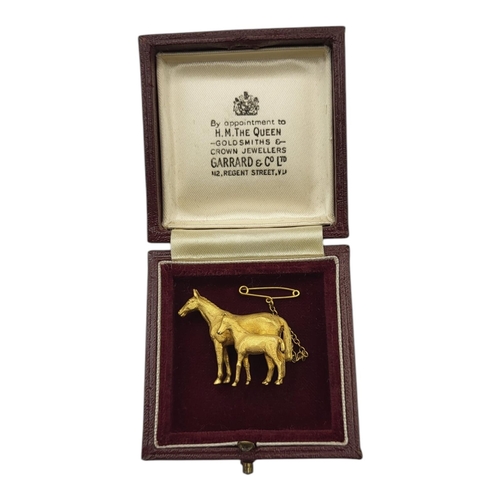 69 - A VINTAGE 9CT GOLD HORSE AND FOAL BROOCH
Standing pose with textured finish, in a fitted velvet line... 