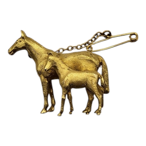 69 - A VINTAGE 9CT GOLD HORSE AND FOAL BROOCH
Standing pose with textured finish, in a fitted velvet line... 