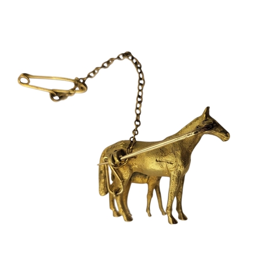 69 - A VINTAGE 9CT GOLD HORSE AND FOAL BROOCH
Standing pose with textured finish, in a fitted velvet line... 