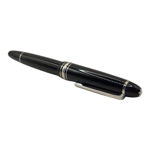 74 - MONTBLANC MEISTERSTÜCK, A BLACK LACQUER AND WHITE METAL BALLPOINT PEN
In a fitted velvet lined box, ... 