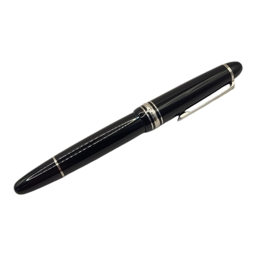 74 - MONTBLANC MEISTERSTÜCK, A BLACK LACQUER AND WHITE METAL BALLPOINT PEN
In a fitted velvet lined box, ... 