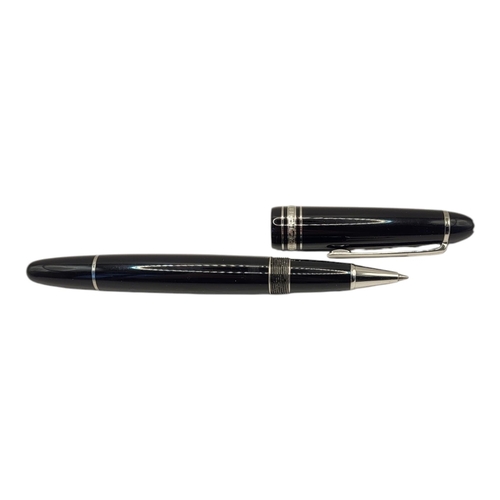 74 - MONTBLANC MEISTERSTÜCK, A BLACK LACQUER AND WHITE METAL BALLPOINT PEN
In a fitted velvet lined box, ... 