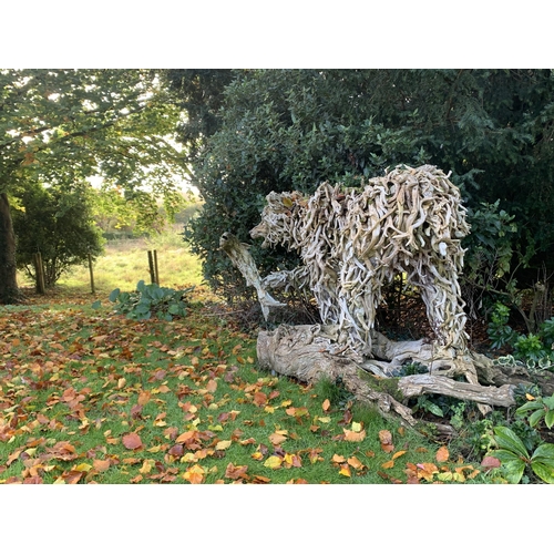 636 - JAMES DORAN WEBB (B.1967), A LIFESIZE GRIZZLY BEAR AND SALMON SCULPTURE. 
Driftwood upon stainless s... 