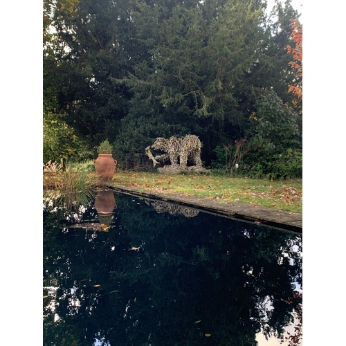 636 - JAMES DORAN WEBB (B.1967), A LIFESIZE GRIZZLY BEAR AND SALMON SCULPTURE. 
Driftwood upon stainless s... 