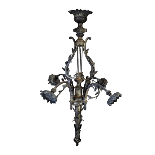 265 - AN EARLY 20TH CENTURY FRENCH HEAVY BRONZE CHANDELIER
With four organic branches applied with leaves ... 