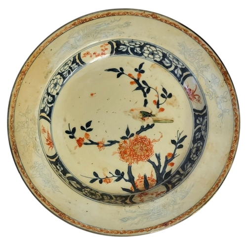 259 - A KANGXI MARK AND PERIOD SHALLOW BOWL
With floral decoration.

Condition: discolouration