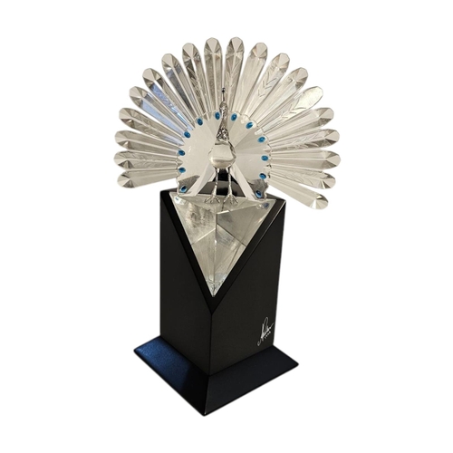 282 - SWAROVSKI, A VINTAGE LIMITED EDITION (09497/10,000) CRYSTAL GLASS AND SILVER PEACOCK
On black plinth... 