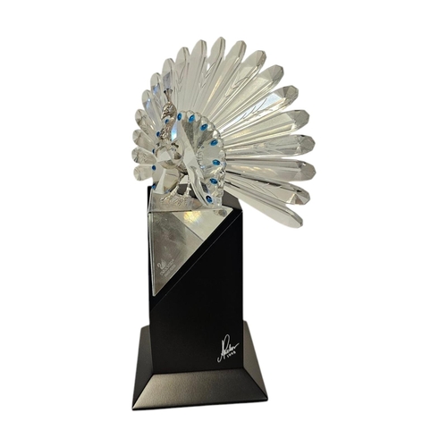 282 - SWAROVSKI, A VINTAGE LIMITED EDITION (09497/10,000) CRYSTAL GLASS AND SILVER PEACOCK
On black plinth... 
