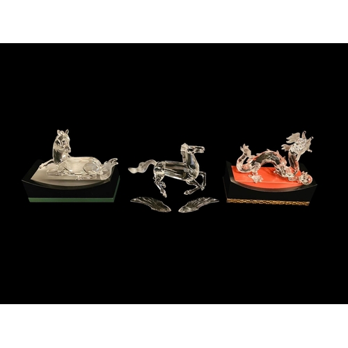 283 - SWAROVSKI, A COLLECTION OF THREE VINTAGE CRYSTAL GLASS FIGURES
To include a dragon in standing pose ... 