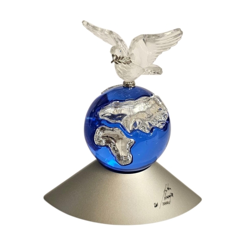 284 - SWAROVSKI, ‘PLANET VISION’, A VINTAGE CRYSTAL GLASS FIGURE, DOVE OF PEACE
On a blue glass planet, de... 