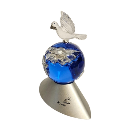 284 - SWAROVSKI, ‘PLANET VISION’, A VINTAGE CRYSTAL GLASS FIGURE, DOVE OF PEACE
On a blue glass planet, de... 