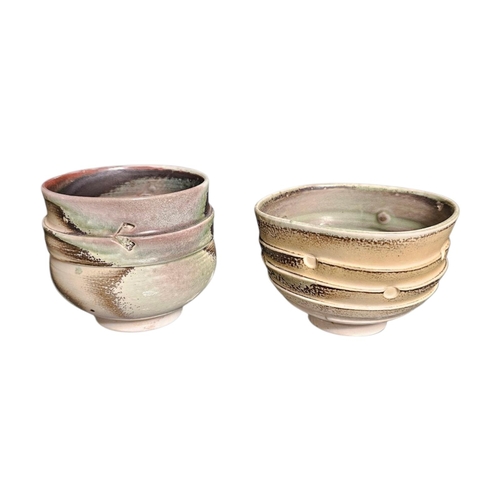371 - JACK DOHERTY, Bn 1948, TWO VINTAGE ART POTTERY BOWLS,
raised and stepped decoration with green glaze... 