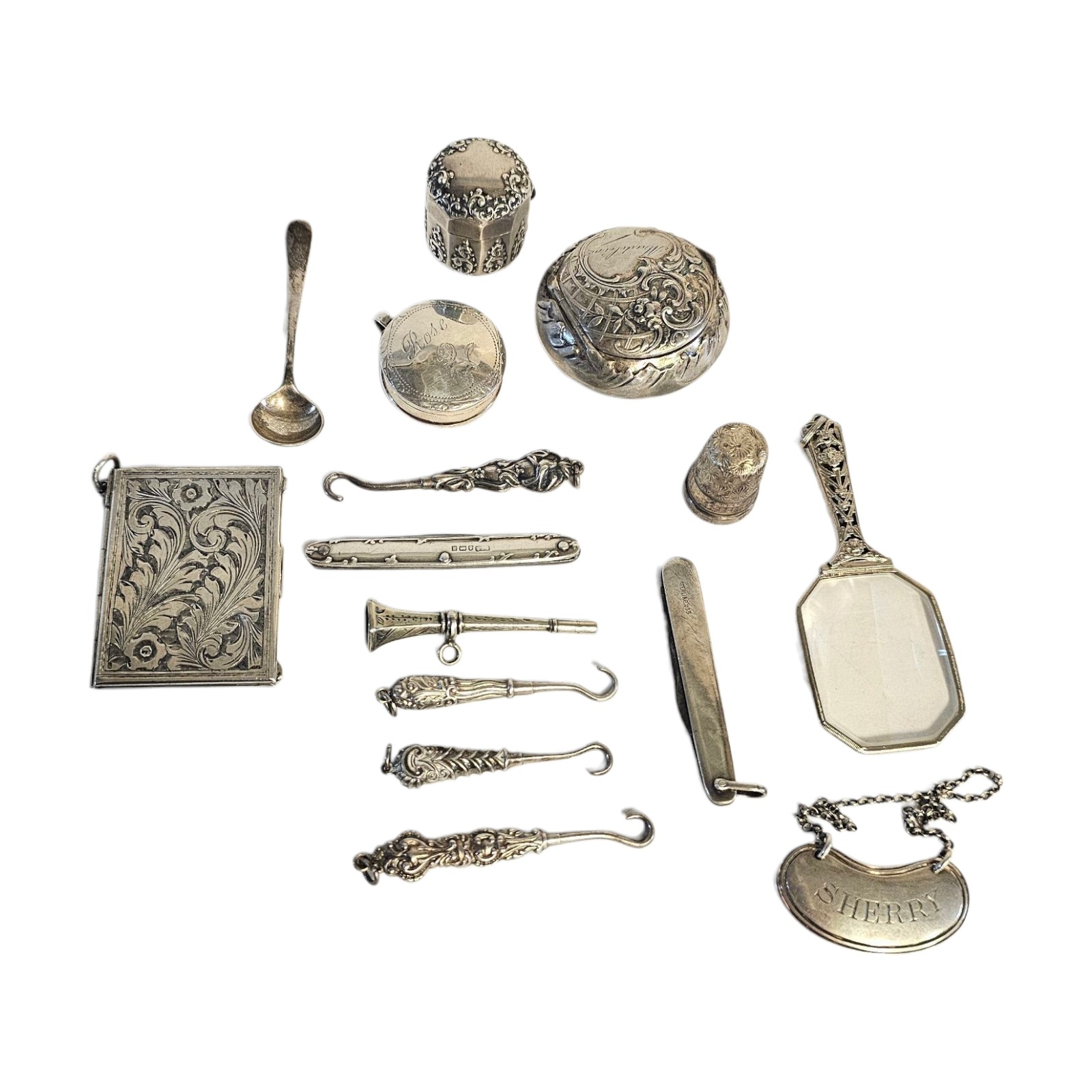 AN EARLY 20TH CENTURY STERLING SILVER THIMBLE BOX Having scrolled ...