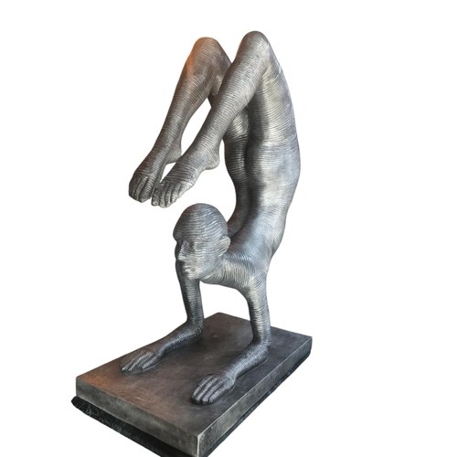 A LIFE SIZE CAST ALUMINIUM STATUE OF A CONTORTIONIST Unsigned Condition ...