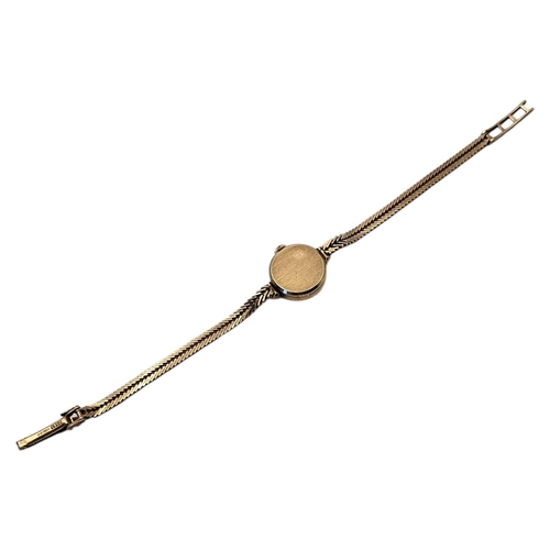 18 - ACCURIST, A VINTAGE 9CT GOLD LADIES’ WRISTWATCH
The circular dial with herringbone design to strap a... 