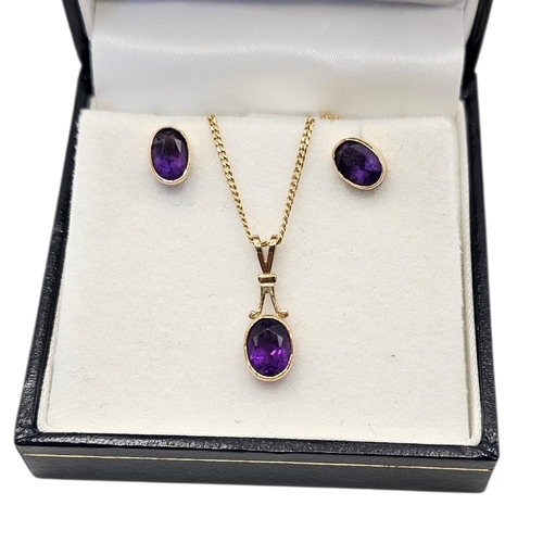 5 - A VINTAGE 9CT GOLD AND AMETHYST NECKLACE AND EARRINGS SET
The single oval cut amethyst on a fine 9ct... 
