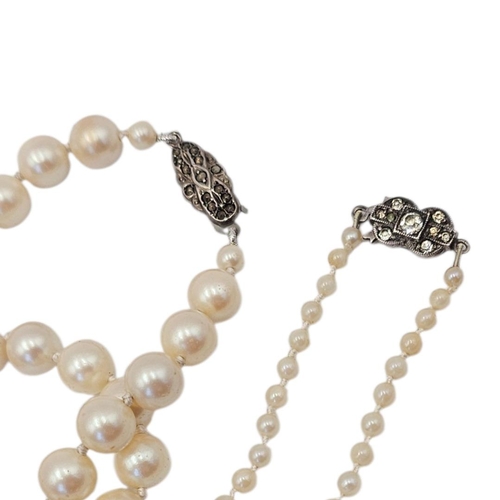 8 - TWO EARLY 20TH CENTURY CULTURED PEARL NECKLACES
To include a single strand set with uniform pearls a... 