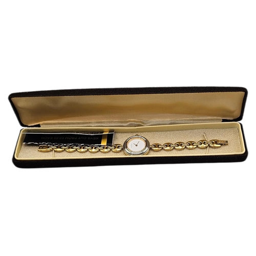 8A - GUCCI, A VINTAGE GOLD PLATED MARINER LINK LADIES’ WRISTWATCH
The circular white dial with gilt hands... 