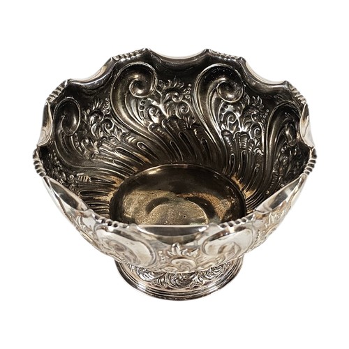 12A - A VICTORIAN SILVER PEDESTAL BOWL
Having a scaled edge and embossed decoration, hallmarked Sheffield,... 