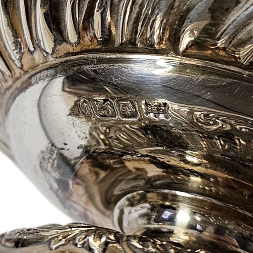 12A - A VICTORIAN SILVER PEDESTAL BOWL
Having a scaled edge and embossed decoration, hallmarked Sheffield,... 