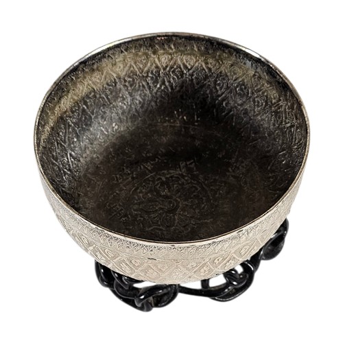 15A - AN EARLY 20TH CENTURY BURMESE SILVER BUDDHIST SINGING BOWL
Having fine engraved decoration.
(approx ... 