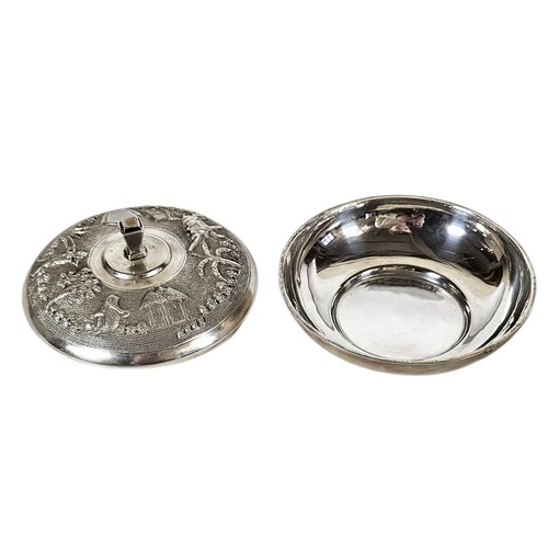 21A - AN EARLY 20TH CENTURY INDIAN SILVER BOWL AND COVER
Having fine traditional figural decoration, marke... 