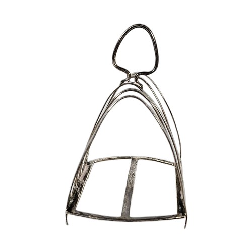 23A - AN EDWARDIAN SILVER TOAST RACK
Plain form, with pierced finial, hallmarked Birmingham 1925.
(approx ... 