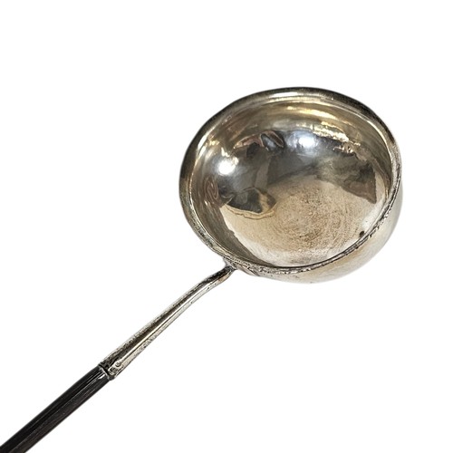 26A - A 19TH CENTURY WHITE METAL AND WHALE BONE PUNCH LADLE
Twist design to handle and oval white metal bo... 