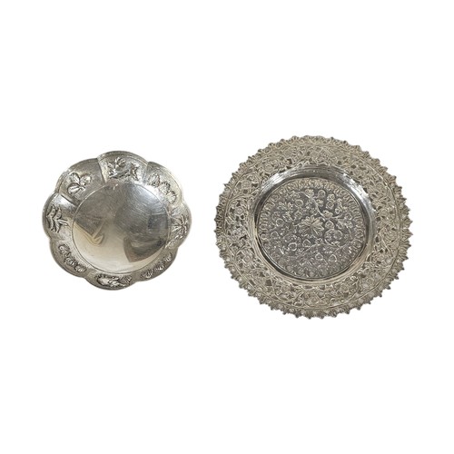 29A - AN EARLY 20TH CENTURY INDIAN SILVER SHALLOW BOWL
Having a scalloped edge with fine engraved decorati... 