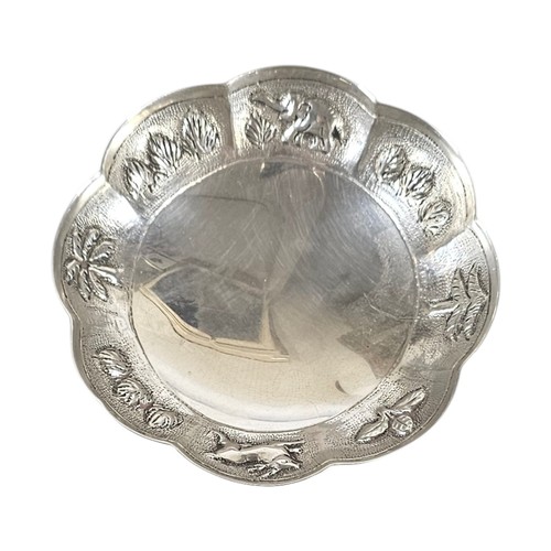 29A - AN EARLY 20TH CENTURY INDIAN SILVER SHALLOW BOWL
Having a scalloped edge with fine engraved decorati... 