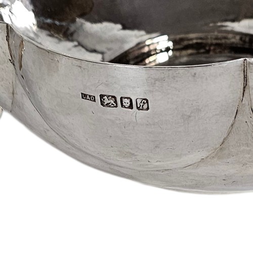 32A - A PAIR OF LARGE 17TH CENTURY SILVER CIRCULAR BOWLS
Having cast side handles, lobed borders and plani... 