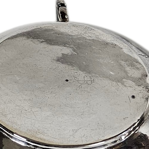 32A - A PAIR OF LARGE 17TH CENTURY SILVER CIRCULAR BOWLS
Having cast side handles, lobed borders and plani... 