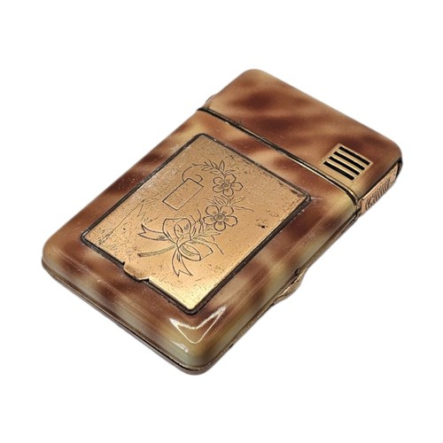 A MID CENTURY COMBINATION CIGARETTE CASE, LIGHTER AND POWDER COMPACT A ...