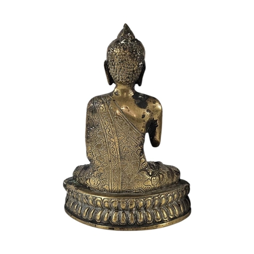 200 - AN EARLY 20TH CENTURY TIBETAN BRONZE FIGURE OF GUATAMA BUDDHA 
Depicted seated in dhyanasana (medita... 