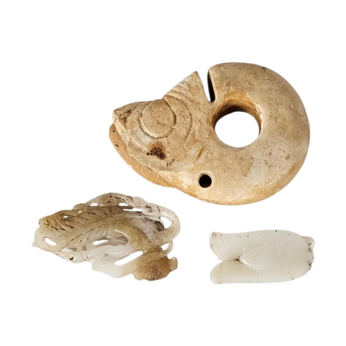 202 - A GROUP OF THREE CHINESE JADE AND HARDSTONE AMULETS
Comprising a pale celadon jade cicada, an intric... 